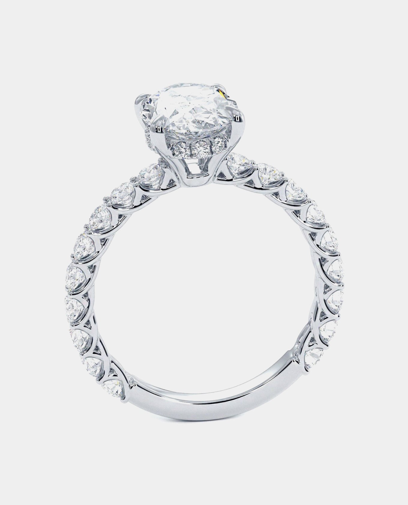 oval melody engagement ring